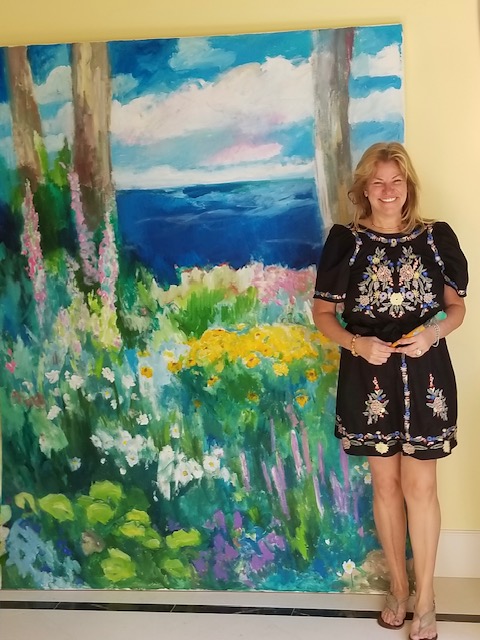 Jos&eacute;e Nadeau in front of her art